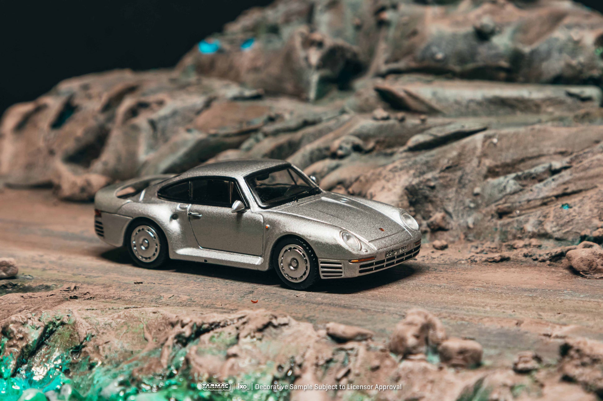 Model car on a rocky surface