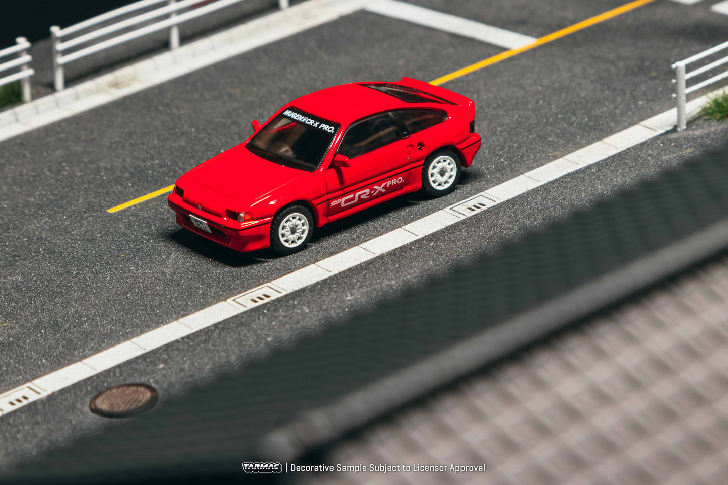 Model car on a miniature road with a clear background
