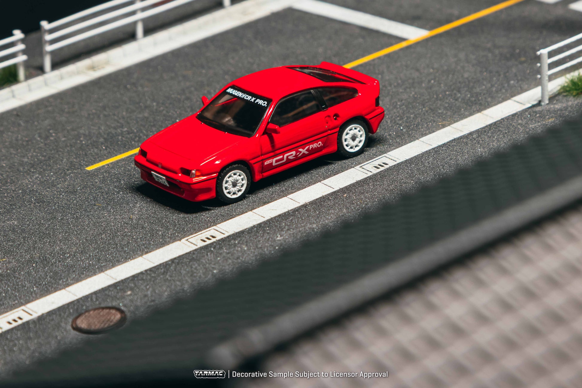 Model car on a miniature road with a clear background