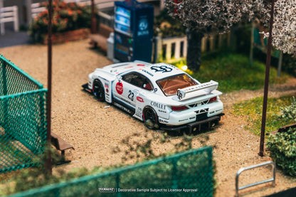 Model car on a miniature race track with a scenic background