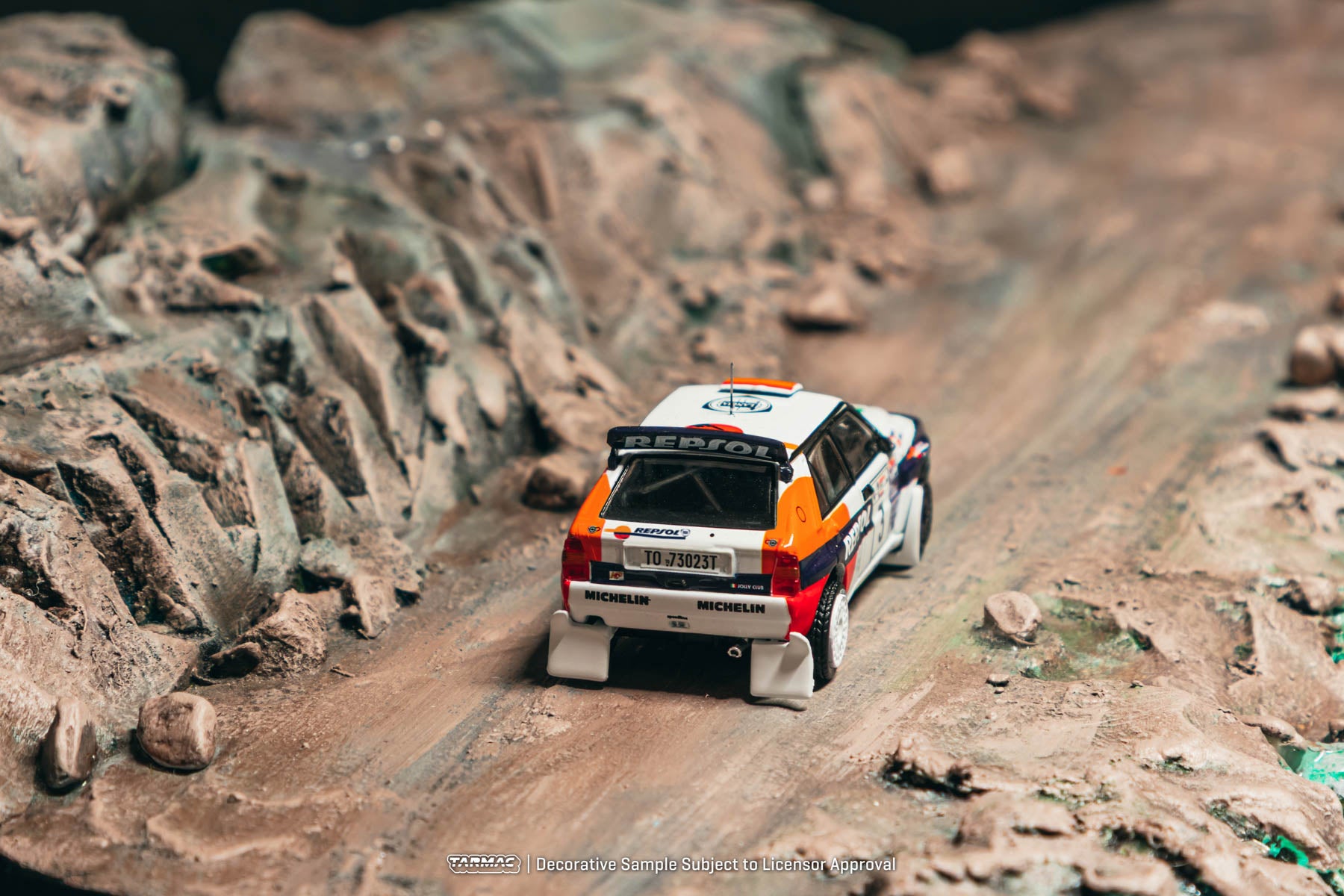 Model car on a rocky landscape