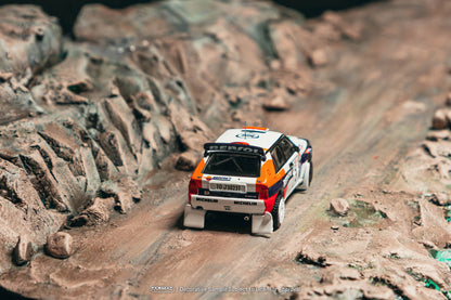 Model car on a rocky landscape