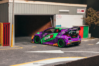 Colorful race car with 'Eva R' branding parked in front of a garage.