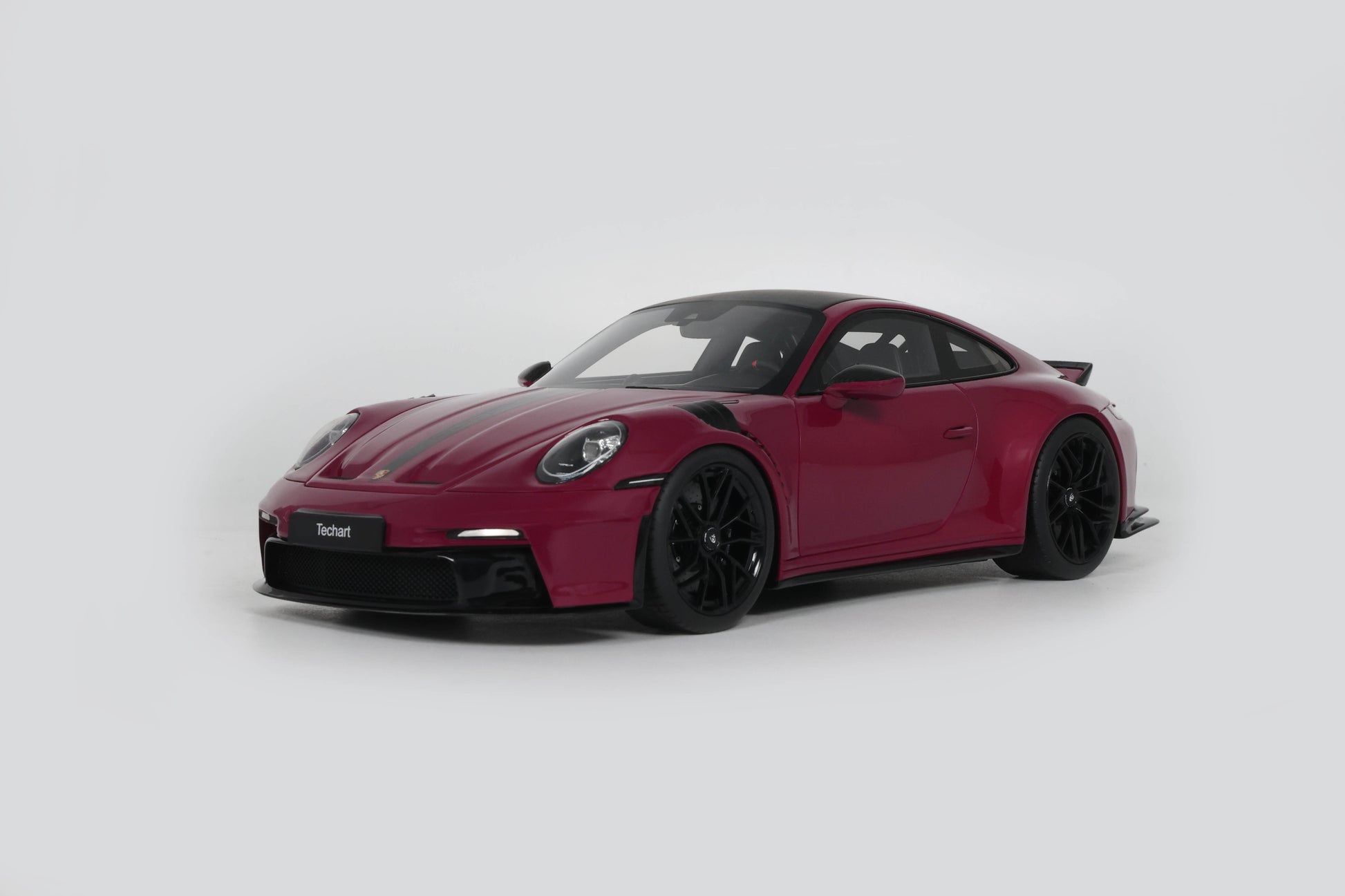 Red sports car on a white background