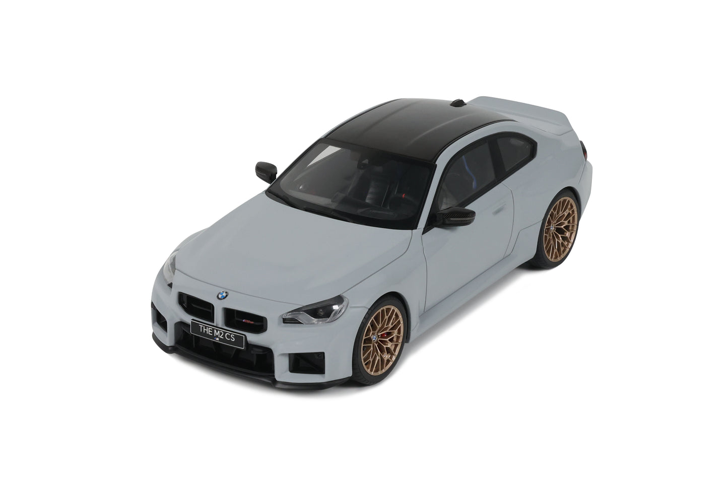 Model car of a BMW on a white background