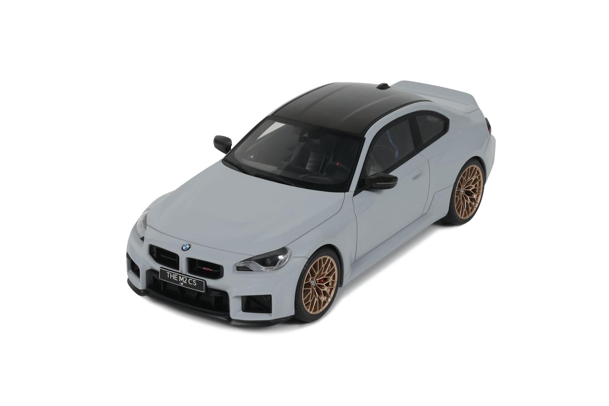 Model car of a BMW on a white background