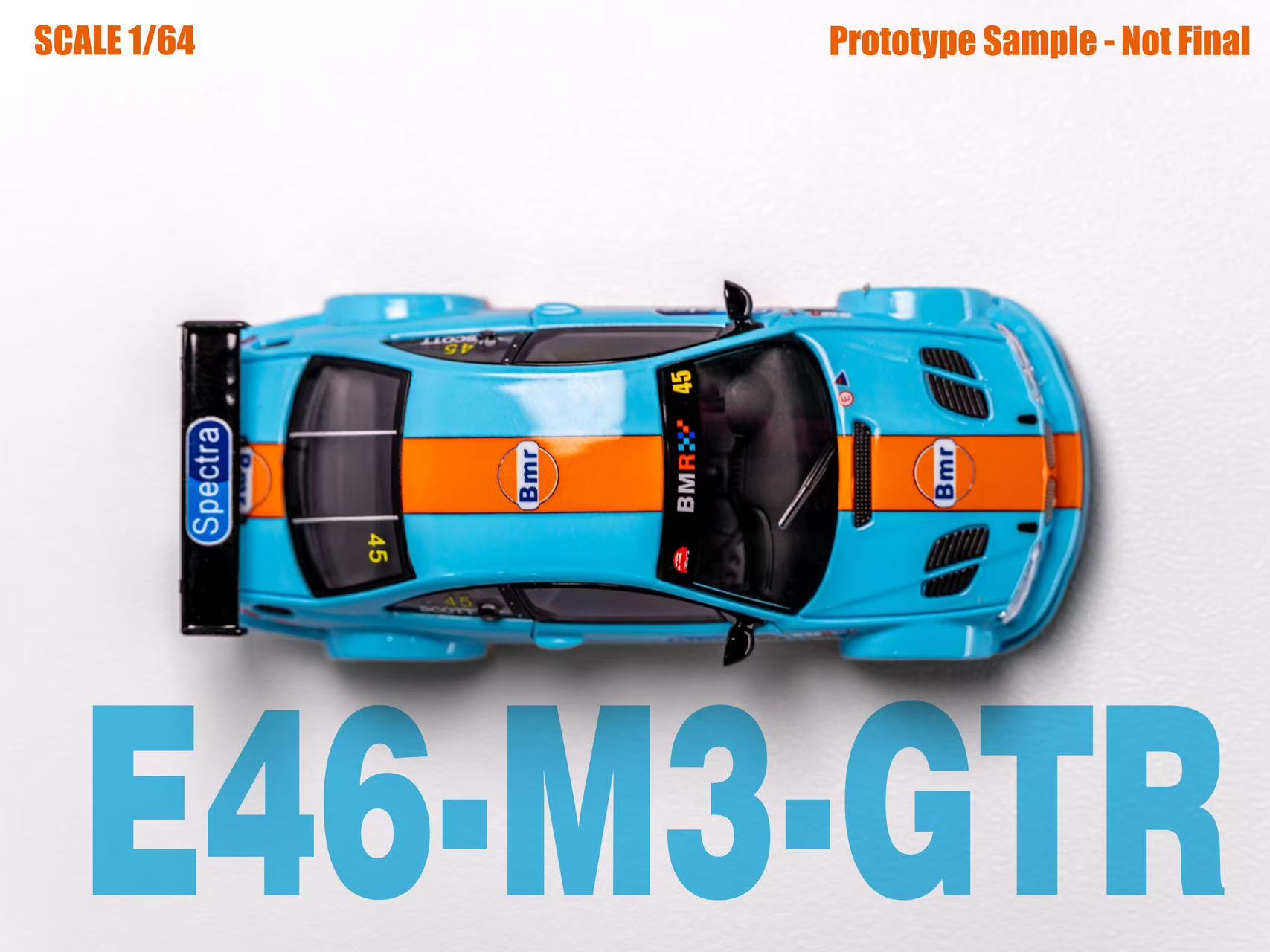Model car E46-M3-GTR with blue and orange design on a white background