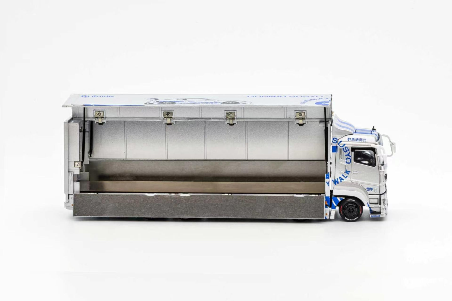 Model truck with a trailer on a white background