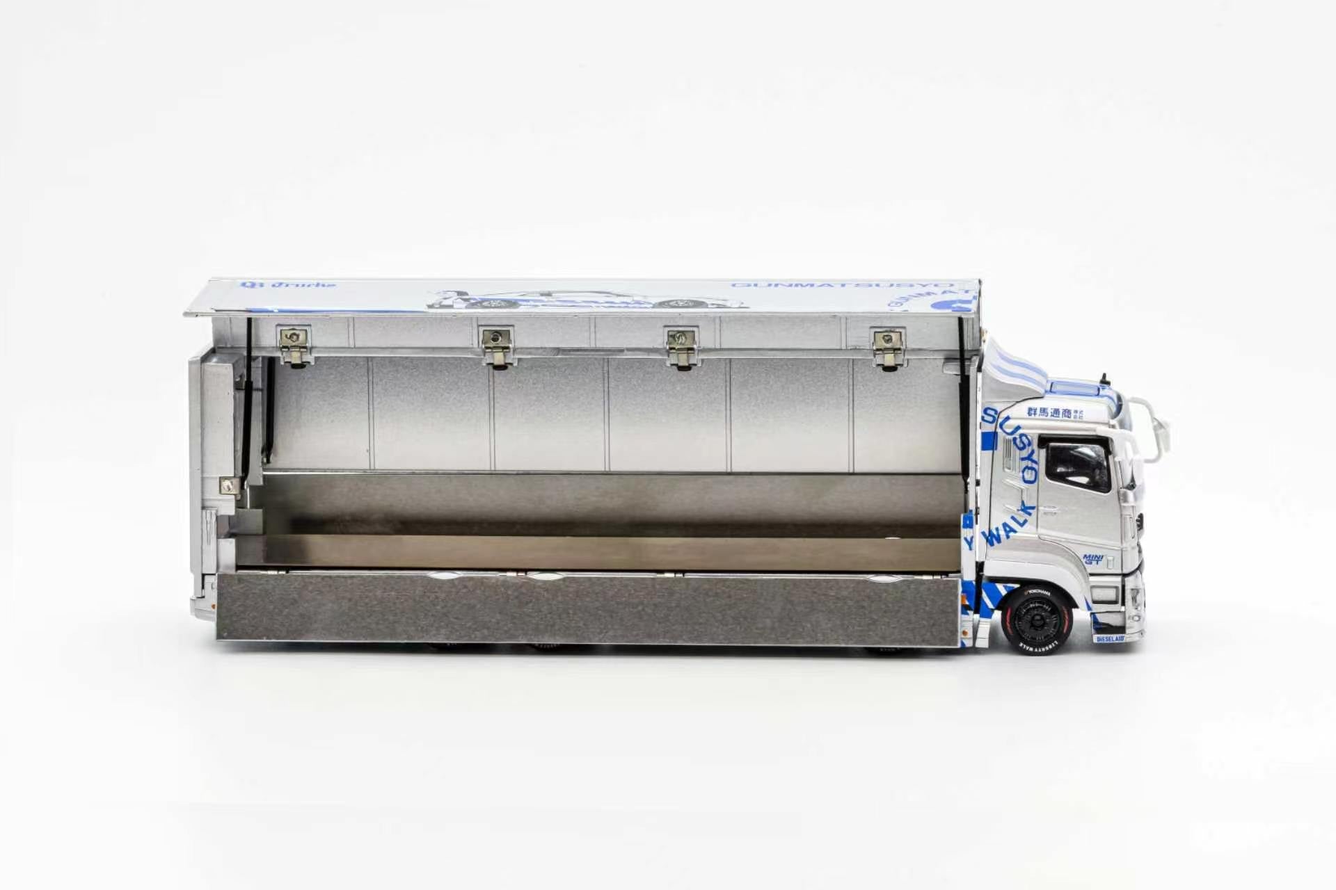 Model truck with a trailer on a white background