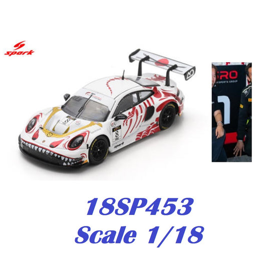 Spark brand 1/18 scale model car, model number 18SP453, featuring a white Porsche 911 GT3 race car with red, black, and gold livery and a shark-face graphic on the front bumper. The image includes a small inset photo of a driver in a team uniform on the right, and blue text at the bottom reading '18SP453 Scale 1/18'.