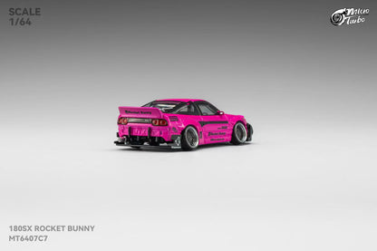 Model car of a pink Rocket Bunny 180SX on a gray background