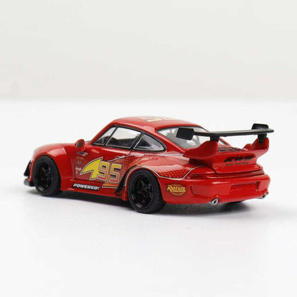 Red model car with black and yellow details on a white background