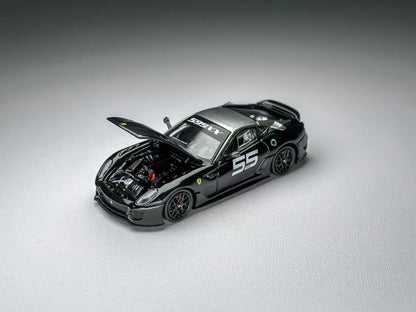 Model car with open hood on a gray background