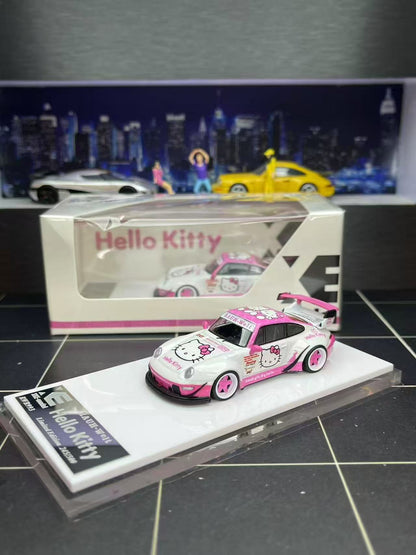 Model car of Hello Kitty design on a display stand with packaging in the background.
