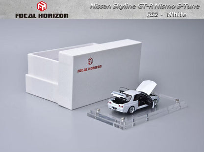 Model car of Nissan Skyline GT-R Nismo S-Tune RS2 in white on a gray background with Focal Horizon branding.