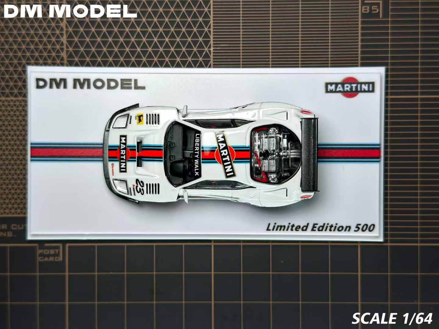 Model car on a display card with 'DM Model' branding on a grid background