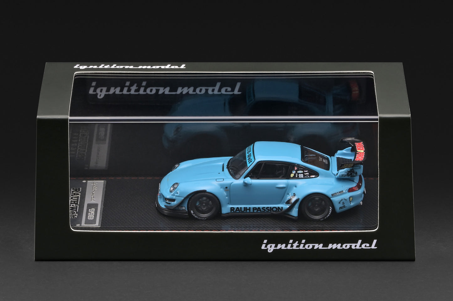 Model car in a clear display case with 'ignition model' branding.