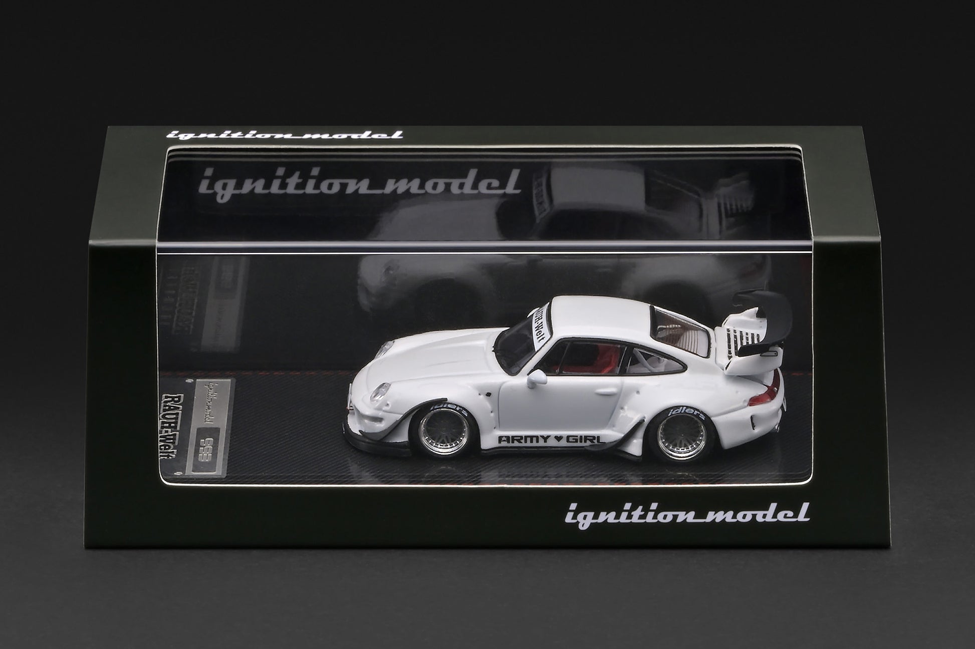 Model car in a clear display case with 'ignition model' branding.