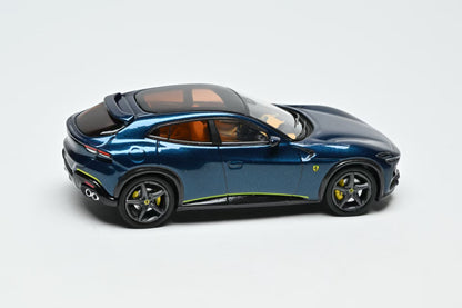 Blue Ferrari SUV model car on a white background