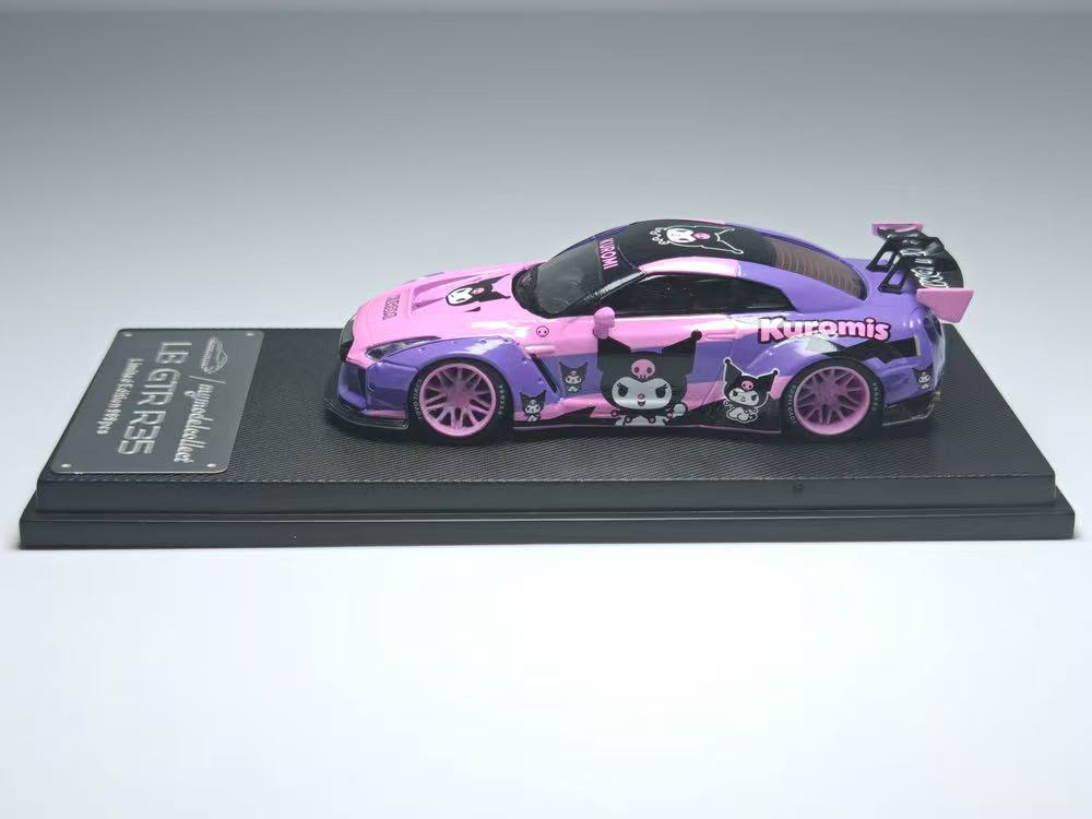 Model car with pink and purple design on a gray background