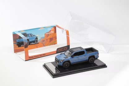 GCD Toyota Tundra Pickup Blue (LHD) with base and acrylic display case in white background