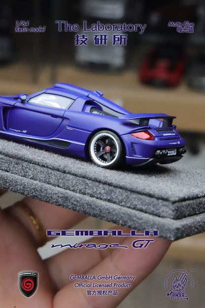 Blue model car on a gray display stand with 'GEMBALLA' branding.