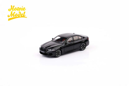Black model car on a white background with 'Howie Model' branding.