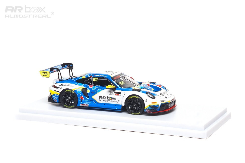 Porsche 911  model race car on a white platform with 'AR Box' branding.