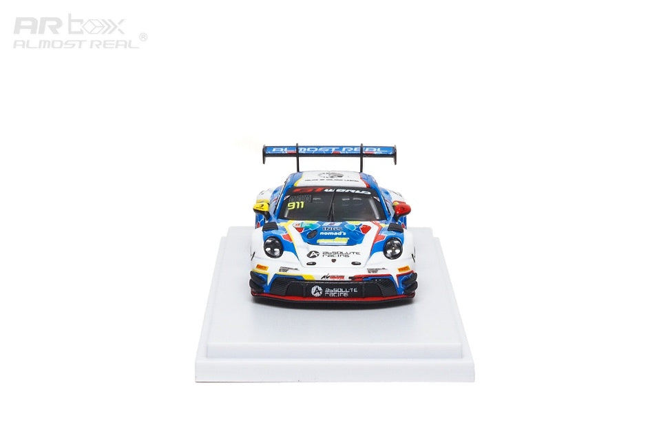 Porsche 911  model race car on a white platform with a white background