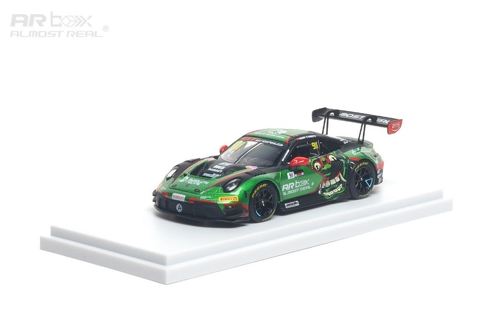 Model car on a white platform with a white background