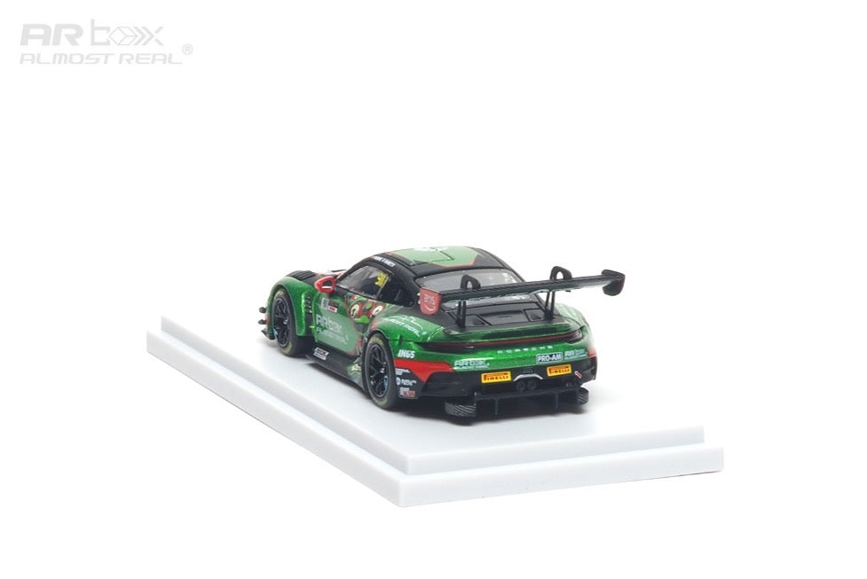 Model car on a white platform with a white background