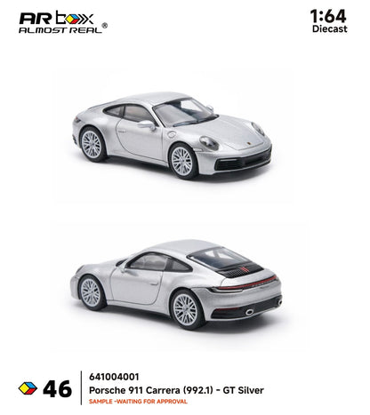 1:64 scale model of a Porsche 911 Carrera (992.1) in GT Silver by Almost Real on a white background.