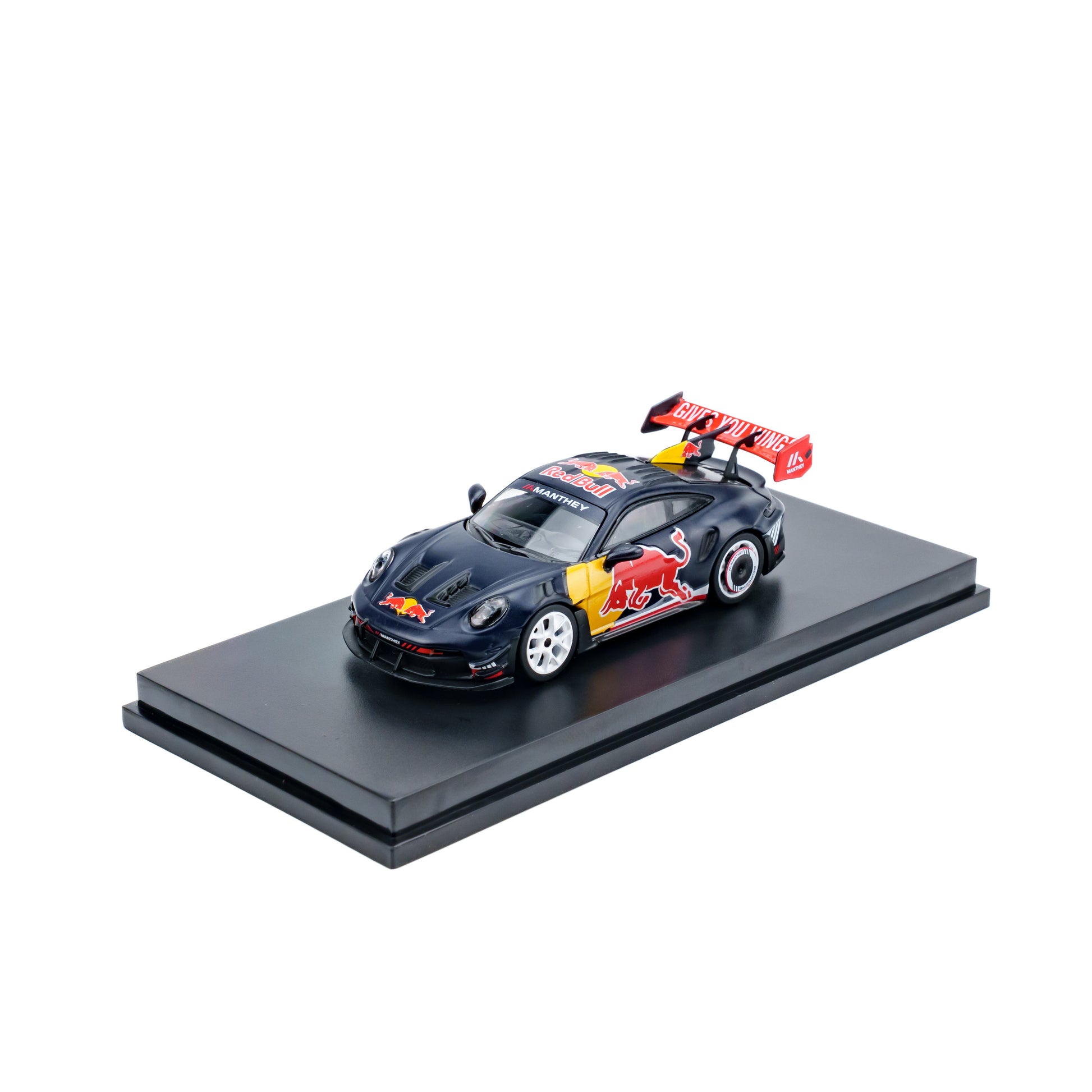 Model car with Red Bull Racing logo on a black platform
