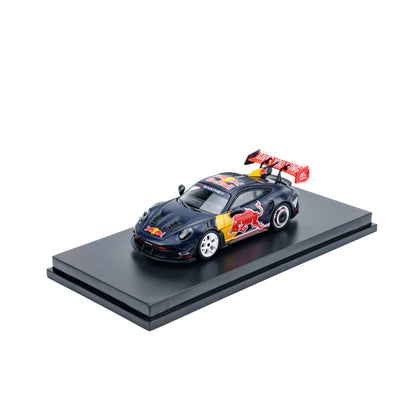 Model car with Red Bull Racing logo on a black platform