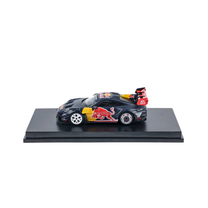 Model car with Red Bull logo on a black platform