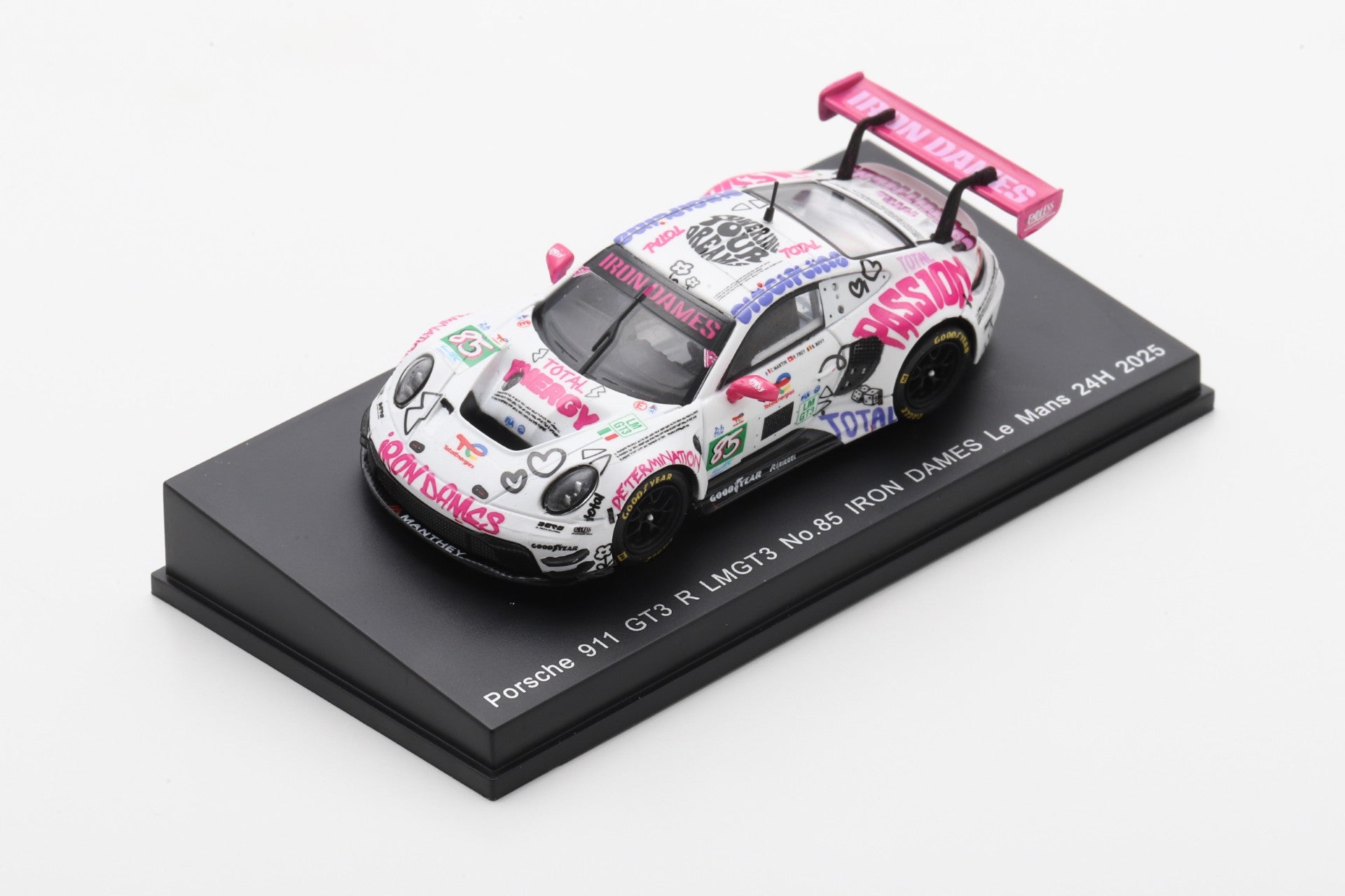 Model of a Porsche 911 GT3 R with a colorful, graffiti-style design and labels on a black display base, exuding a vibrant, energetic tone.
