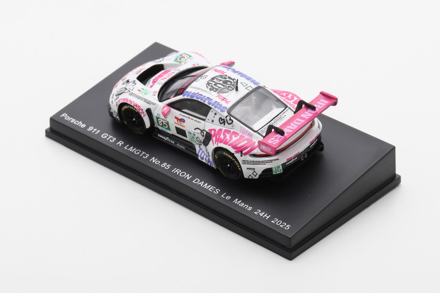 Model of a Porsche 911 GT3 R on a black display stand with colorful livery.