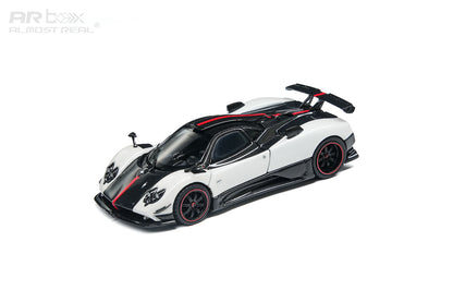 A white and black Pagani Zonda R1 scale model car with red accents, featuring an open driver-side door and rear spoiler, shown on a clean white background with an ARbox watermark.