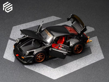 Model car with open doors on a gray background
