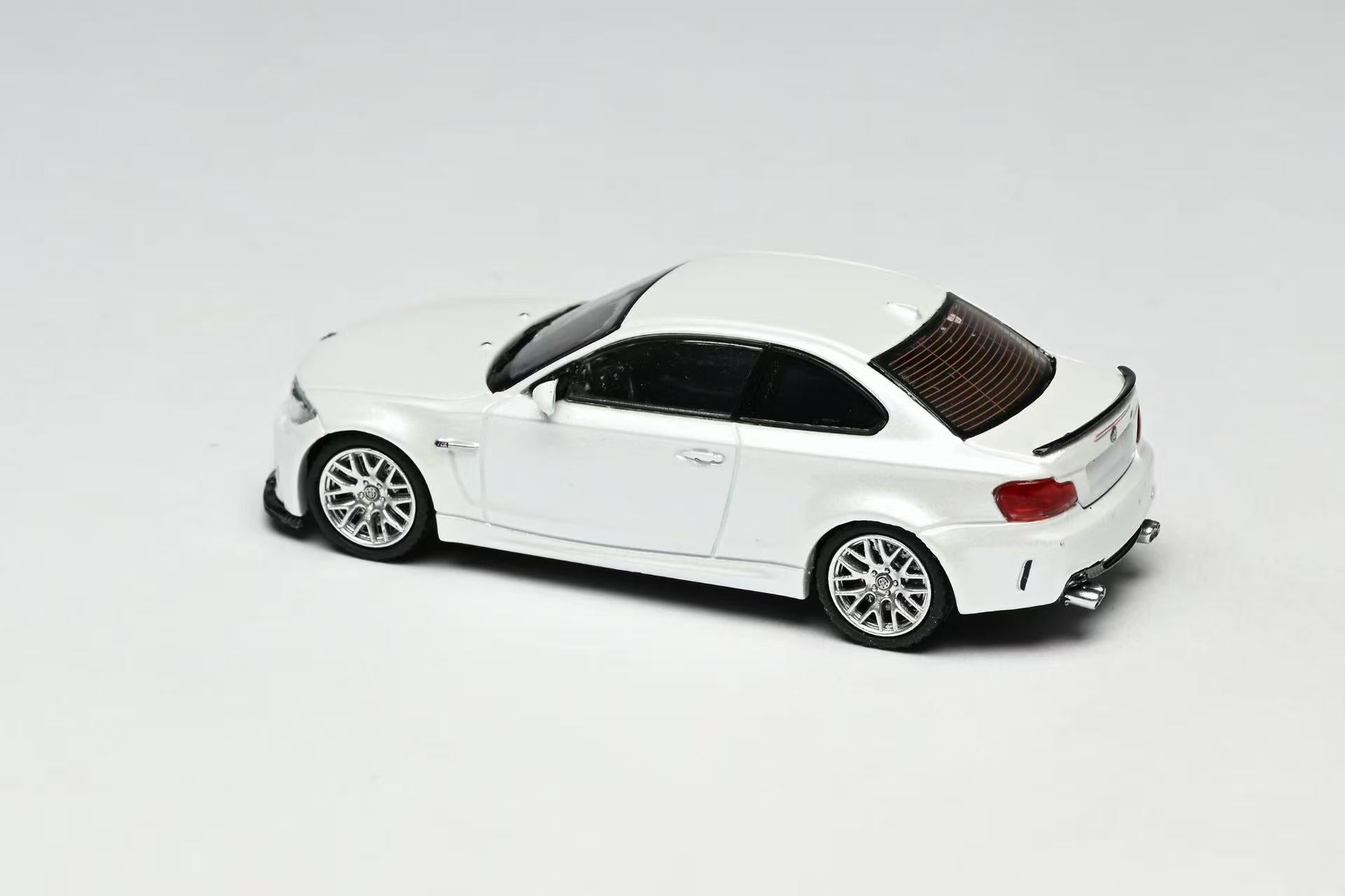 White model car on a light gray background
