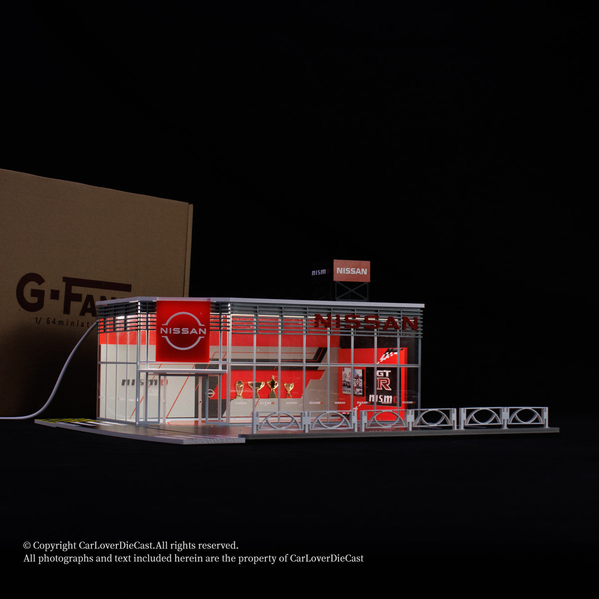 Model of a Nissan building with a dark background