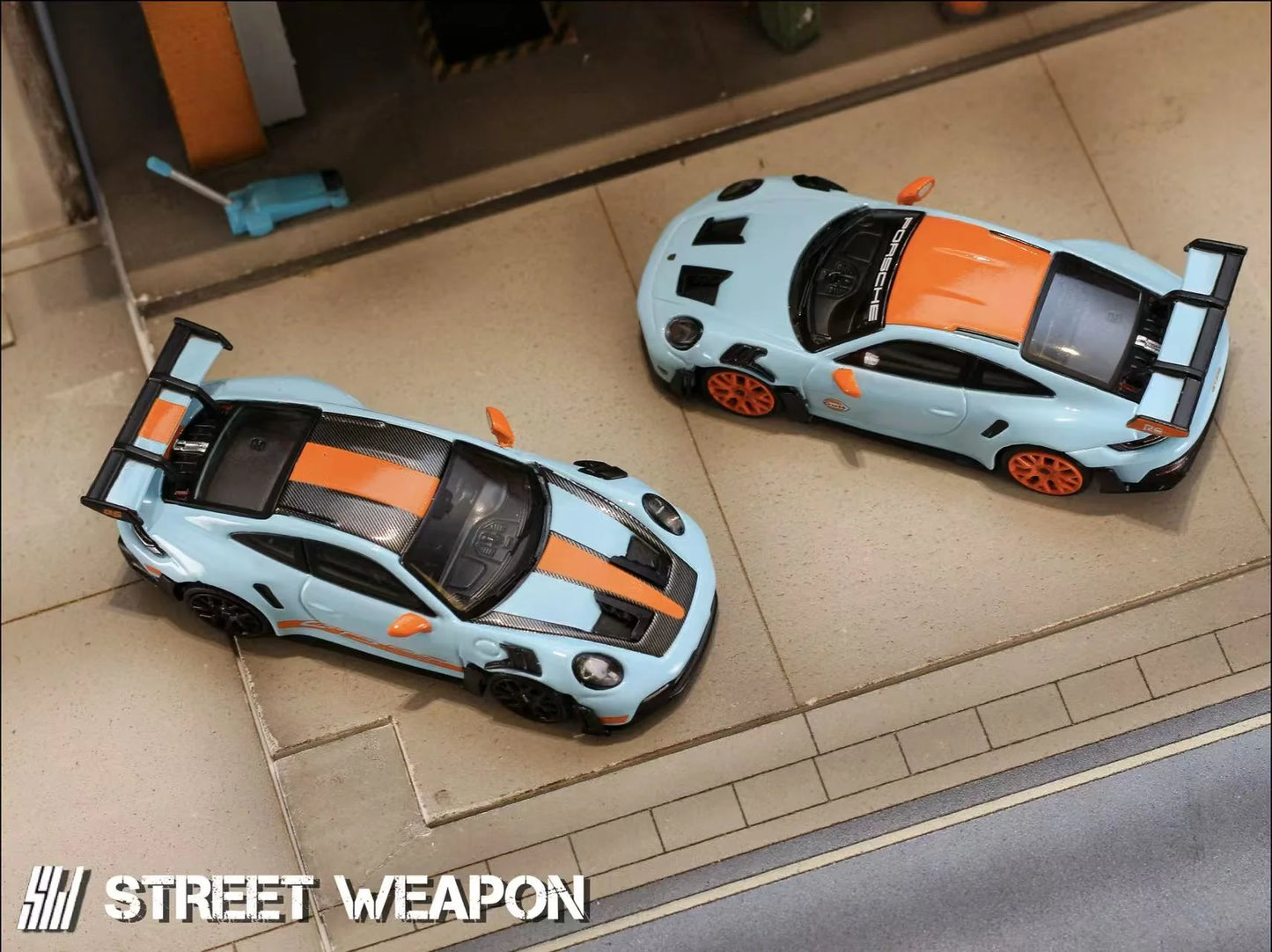 Street Weapon 1:64 992 GT3 RS GULF - Gulf Blue Carbon Top Black Wheels (Preorder)