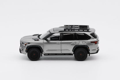 Model SUV with roof rack on a white background