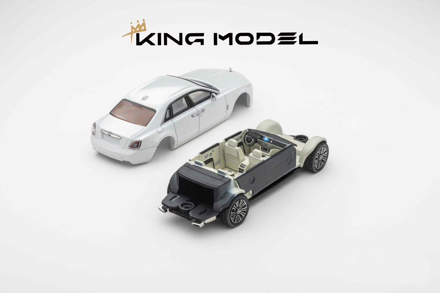 Model cars of a white sedan and an open-top vehicle on a white background with 'KING MODEL' branding.