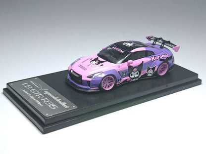 Model car on a display stand with a gray background