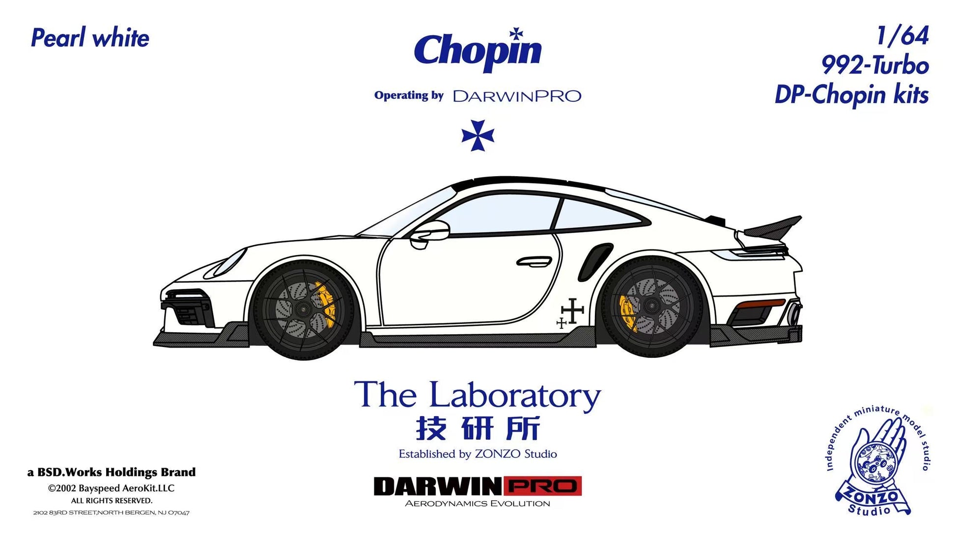 Model car kit packaging for a Porsche 992 Turbo with branding and specifications.