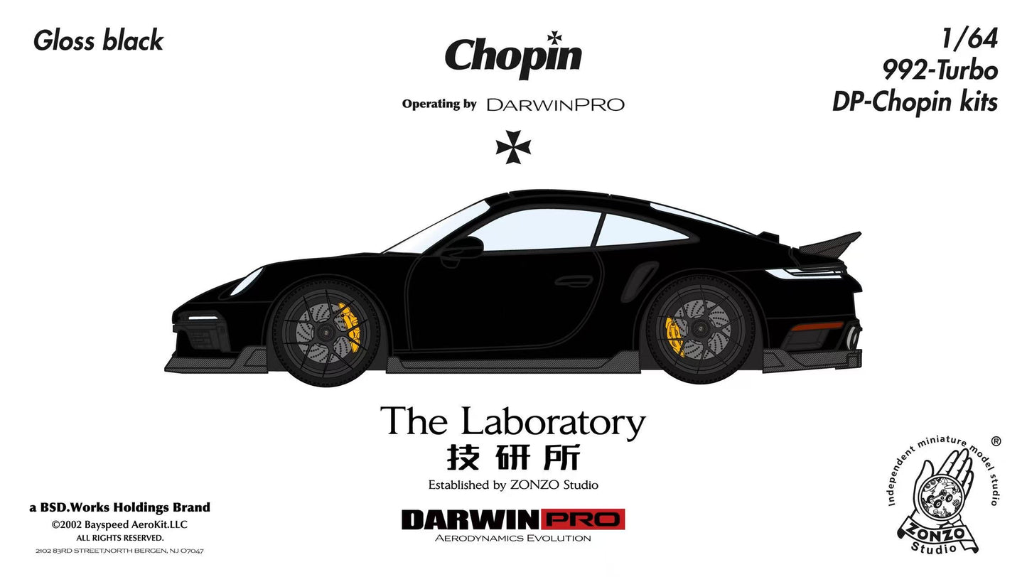 Model car kit of a black sports car with branding and specifications on a white background