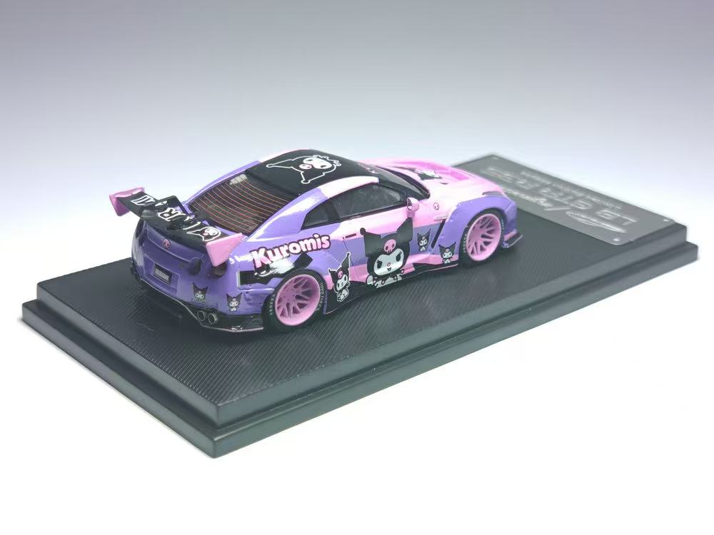 Model car with pink and purple design on a gray platform