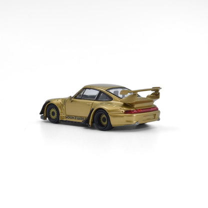 Gold model car with a large rear wing on a white background