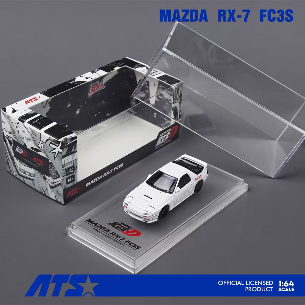 Model car of Mazda RX-7 FC3S on a clear display stand with packaging in the background.